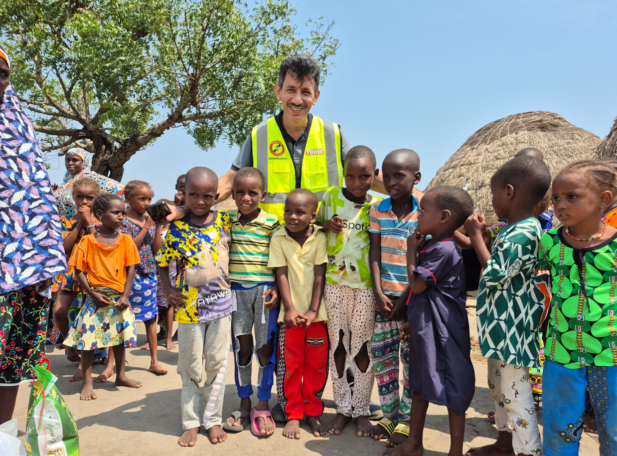 Community members collaborating with Tudec